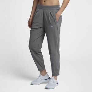 Nike Gray Track Pants with Tapered Fit and Cuffed Ankles